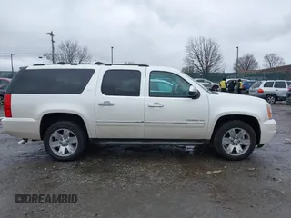 2012 GMC Yukon XL SLT with VIN 1GKS2KE77CR205341, listed as a IAAI auction lot 41565367 with 165,500 mi miles. Bid and sale history available at carsss.com. Image 13.