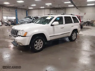 2009 Jeep Grand Cherokee Limited with VIN 1J8GR58K29C553812, listed as a IAAI auction lot 41520065 with 203,595 mi miles. Bid and sale history available at carsss.com. Image 2.
