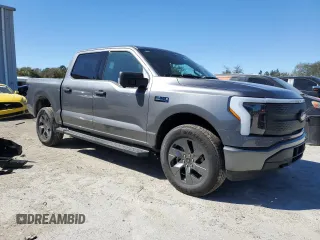 2024 Ford F-150 Lightning XLT with VIN 1FTVW3LK0RWG24006, listed as a Copart auction lot 47560225 with 6,645 mi miles and Salvage title. Bid and sale history available at DreamBid. Image 4.