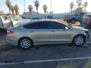 2015 Ford Fusion SE z VIN 3FA6P0H79FR137377, wystawiony jako IAAI lot #41345497 z przebiegiem 170 533 mil mil oraz . Historia ofert i sprzedaży dostępna na DreamBid. Obrazek 14.