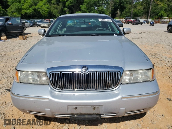 2002 Mercury Grand Marquis GS z VIN 2MEFM74W82X659338, wystawiony jako Copart lot #53887785 z przebiegiem 155 266 mil mil oraz Szkoda całkowita • Salvage title. Historia ofert i sprzedaży dostępna na DreamBid. Obrazek 5.