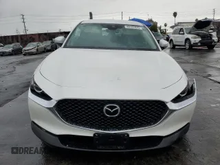 2023 Mazda CX-30 S with VIN 3MVDMBAM4PM522056, listed as a Copart auction lot 49122975 with 16,624 mi miles and Salvage title. Bid and sale history available at DreamBid. Image 5.