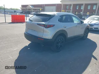 2024 Mazda CX-30 2.5 S Select Sport with VIN 3MVDMBBM4RM689518, listed as a IAAI auction lot 42021872 with 5,041 mi miles. Bid and sale history available at carsss.com. Image 4.