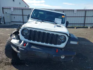 2024 Jeep Wrangler Rubicon with VIN 1C4PJXFG9RW307699, listed as a IAAI auction lot 42047562 with Not Provided miles. Bid and sale history available at carsss.com. Image 12.