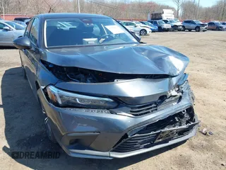 2024 Honda Civic EX z VIN 2HGFE1F76RH314980, wystawiony jako IAAI lot #42000094 z przebiegiem 13 576 mil mil oraz . Historia ofert i sprzedaży dostępna na DreamBid. Obrazek 17.