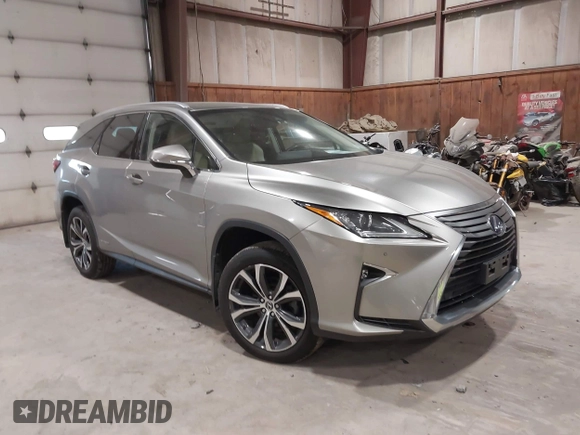 2018 Lexus RX 450hL Premium z VIN JTJDGKCA6J2004313, wystawiony jako IAAI lot #42270567 z przebiegiem 72 692 mil mil oraz . Historia ofert i sprzedaży dostępna na DreamBid. Obrazek 1.