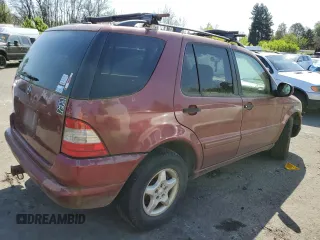 2001 Mercedes-Benz M 320/430/500 with VIN 4JGAB54E91A256176, listed as a Copart auction lot 55610525 with 215,120 mi miles and Salvage Title. Bid and sale history available at DreamBid. Image 3.