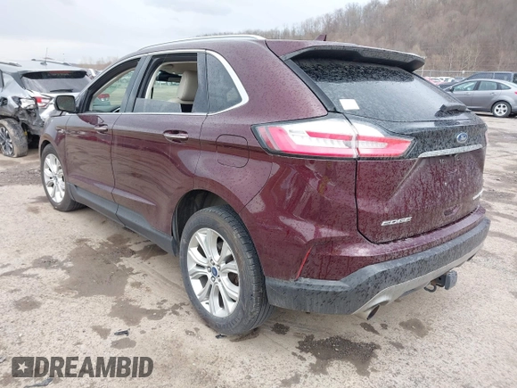2020 Ford Edge Titanium with VIN 2FMPK4K90LBA26169, listed as a IAAI auction lot 41848710 with 86,987 mi miles. Bid and sale history available at carsss.com. Image 3.