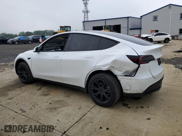 2024 Tesla Model Y Long Range with VIN 7SAYGDEE2RA329081, listed as a Copart auction lot 57254265 with 2,325 mi miles and Salvage title. Bid and sale history available at DreamBid. Image 2.