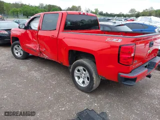 2017 Chevrolet Silverado 1500 LT with VIN 3GCUKREC6HG327304, listed as a IAAI auction lot 41918774 with 149,878 mi miles. Bid and sale history available at carsss.com. Image 3.