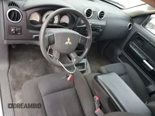2007 Mitsubishi Raider LS z VIN 1Z7HC22K57S125180, wystawiony jako Copart lot #79241794 z przebiegiem 175 110 mil mil oraz Szkoda całkowita • Salvage title. Historia ofert i sprzedaży dostępna na DreamBid. Obrazek 8.