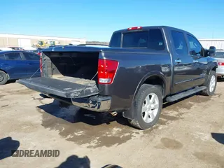 2011 Nissan Titan SL with VIN 1N6BA0EC5BN307529, listed as a IAAI auction lot 41729522 with 221,260 mi miles. Bid and sale history available at carsss.com. Image 4.