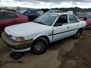 1991 Toyota Camry z VIN 4T1SV24E5MU355011, wystawiony jako Copart lot #51021185 z przebiegiem 135 881 mil mil oraz Czysty tytuł • Clean title. Historia ofert i sprzedaży dostępna na DreamBid. Obrazek 1.