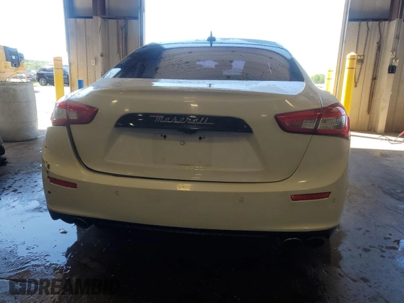 2017 Maserati Ghibli S Q4 z VIN ZAM57RTAXH1221570, wystawiony jako Copart lot #56003065 z przebiegiem 96 414 mil mil oraz Szkody całkowita. Historia ofert i sprzedaży dostępna na DreamBid. Obrazek 6.