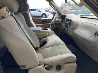 2003 Ford F-150 XL with VIN 1FTRX17203KA95359, listed as a IAAI auction lot 41891118 with 206,393 mi miles. Bid and sale history available at carsss.com. Image 5.