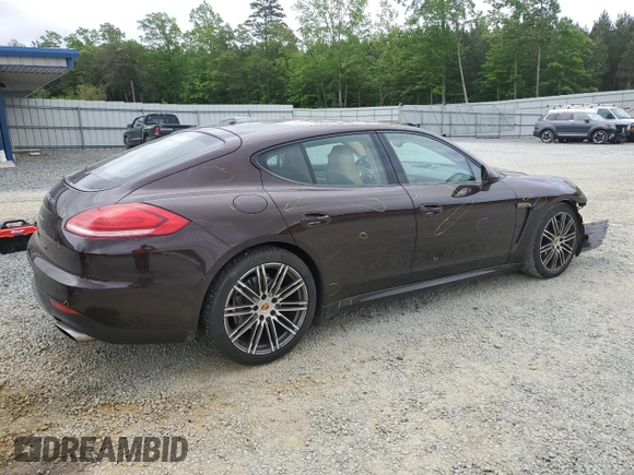 2016 Porsche Panamera 4 с VIN WP0AA2A7XGL007121, выставлен на аукционе Copart как лот 54559365 с пробегом 84 955 миль миль и Списание • Salvage title. История ставок и продаж доступна на DreamBid. Изображение 3.