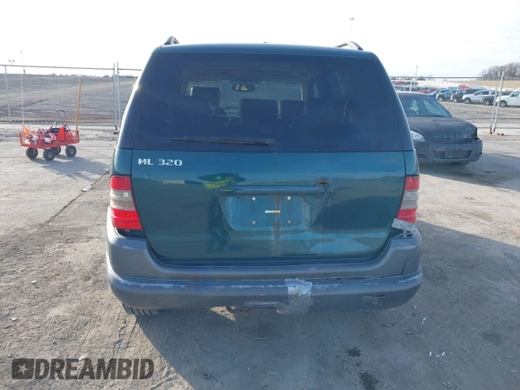 1998 Mercedes-Benz M-Class with VIN 4JGAB54E7WA034632, listed as a IAAI auction lot 41523291 with 153,241 mi miles. Bid and sale history available at carsss.com. Image 12.