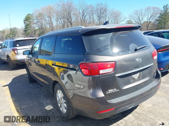 2017 Kia Sedona LX with VIN KNDMB5C14H6329340, listed as a IAAI auction lot 41803814 with 106,672 mi miles. Bid and sale history available at carsss.com. Image 3.