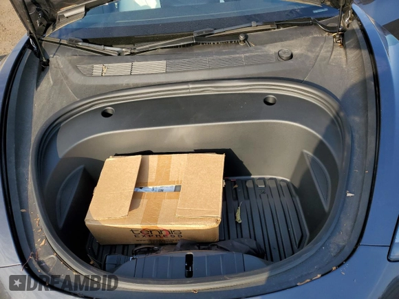 2023 Tesla Model 3 Long Range with VIN 5YJ3E1EBXPF660900, listed as a Copart auction lot 48923265 with 9,954 mi miles and Salvage Title. Bid and sale history available at DreamBid. Image 12.