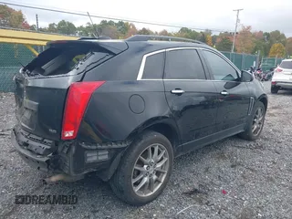 2015 Cadillac SRX z VIN 3GYFNAE30FS515953, wystawiony jako IAAI lot #40562508 z przebiegiem 163 112 mil mil oraz . Historia ofert i sprzedaży dostępna na DreamBid. Obrazek 4.