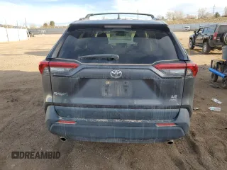 2019 Toyota RAV4 LE with VIN JTMF1RFV0KJ018803, listed as a Copart auction lot 49893715 with 77,595 mi miles and Salvage Title. Bid and sale history available at DreamBid. Image 6.