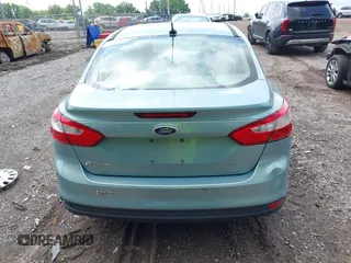 2012 Ford Focus SE with VIN 1FAHP3F25CL261609, listed as a IAAI auction lot 42517968 with 169,109 mi miles and . Bid and sale history available at DreamBid. Image 13.