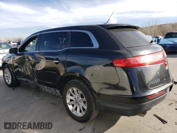 2015 Lincoln MKT with VIN 2LMHJ5NK0FBL03357, listed as a Copart auction lot 87189024 with 228,046 mi miles and Salvage Title. Bid and sale history available at carsss.com. Image 2.