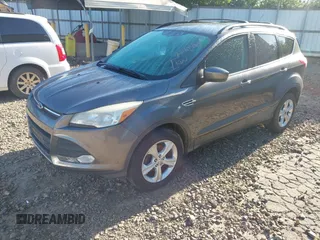 2013 Ford Escape SE with VIN 1FMCU0GX5DUD22065, listed as a IAAI auction lot 42529493 with 134,200 mi miles and . Bid and sale history available at DreamBid. Image 2.