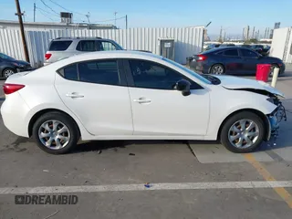 2015 Mazda 3 i SV with VIN JM1BM1T73F1225611, listed as a IAAI auction lot 41622606 with 115,892 mi miles. Bid and sale history available at carsss.com. Image 14.