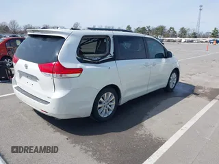 2011 Toyota Sienna XLE AAS with VIN 5TDYK3DC8BS085477, listed as a IAAI auction lot 41934541 with 131,768 mi miles and . Bid and sale history available at DreamBid. Image 4.