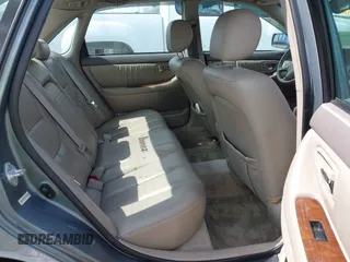 2001 Toyota Avalon XL z VIN 4T1BF28B01U138040, wystawiony jako IAAI lot #42320480 z przebiegiem 220 086 mil mil oraz . Historia ofert i sprzedaży dostępna na DreamBid. Obrazek 8.