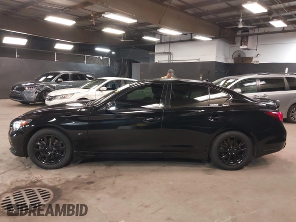 2014 Infiniti Q50 Sport with VIN JN1BV7AR0EM704993, listed as a IAAI auction lot 42492764 with 64,811 mi miles and . Bid and sale history available at DreamBid. Image 14.