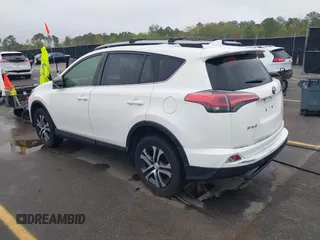 2017 Toyota RAV4 LE with VIN JTMZFREV9HJ704296, listed as a IAAI auction lot 41876996 with 85,605 mi miles and . Bid and sale history available at DreamBid. Image 3.