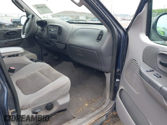 2003 Ford F-150 XLT with VIN 1FTRW08L63KD55851, listed as a IAAI auction lot 42359388 with Not provided miles and . Bid and sale history available at DreamBid. Image 5.