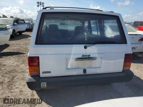 1993 Jeep Cherokee Sport с VIN 1J4FJ68S4PL555701, выставлен на аукционе Copart как лот 76020714 с пробегом 130 884 миль миль и Списание • Salvage title. История ставок и продаж доступна на DreamBid. Изображение 6.