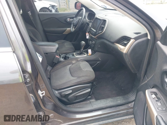 2017 Jeep Cherokee Latitude with VIN 1C4PJLCB1HW574447, listed as a IAAI auction lot 42395204 with 102,985 mi miles and . Bid and sale history available at DreamBid. Image 5.