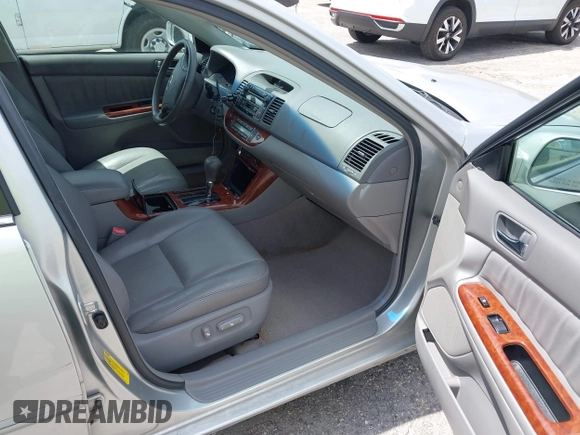 2005 Toyota Camry LE with VIN 4T1BF30KX5U088710, listed as a IAAI auction lot 42113518 with 182,277 mi miles and . Bid and sale history available at DreamBid. Image 5.