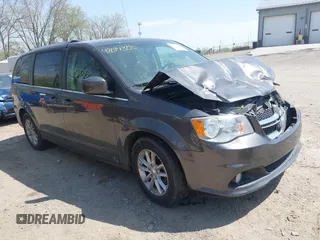 2018 Dodge Grand Caravan SXT z VIN 2C4RDGCG4JR216440, wystawiony jako IAAI lot #42074355 z przebiegiem 129 207 mil mil oraz . Historia ofert i sprzedaży dostępna na DreamBid. Obrazek 1.