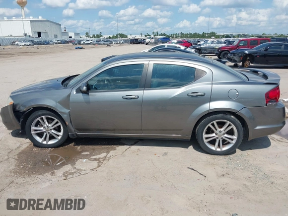2012 Dodge Avenger SXT with VIN 1C3CDZCB9CN212328, listed as a IAAI auction lot 42360745 with 189,311 mi miles and . Bid and sale history available at DreamBid. Image 14.