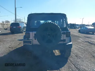 2013 Jeep Wrangler Sport with VIN 1C4AJWAG1DL595509, listed as a IAAI auction lot 41814406 with 59,263 mi miles and . Bid and sale history available at DreamBid. Image 17.