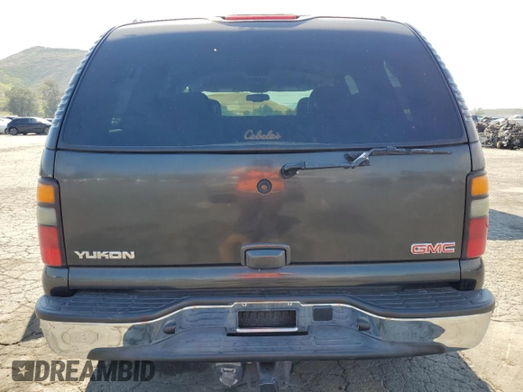 2004 GMC Yukon SLT with VIN 1GKEC13T54R296969, listed as a Copart auction lot 52738825 with 185,049 mi miles and Salvage Title. Bid and sale history available at carsss.com. Image 6.