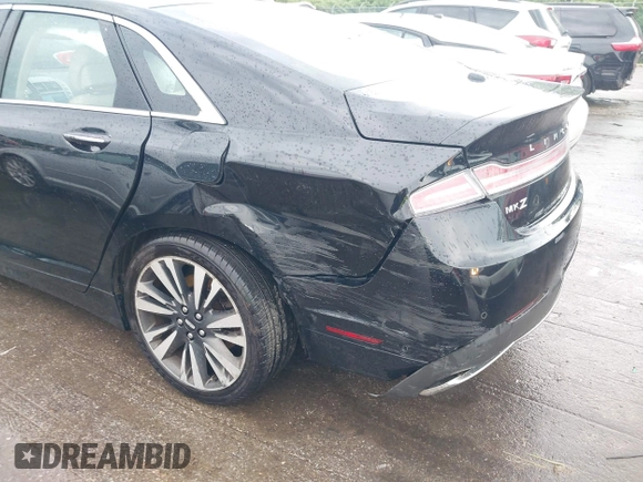 2017 Lincoln MKZ Reserve with VIN 3LN6L5FC5HR615781, listed as a IAAI auction lot 42419285 with 77,459 mi miles and . Bid and sale history available at DreamBid. Image 6.