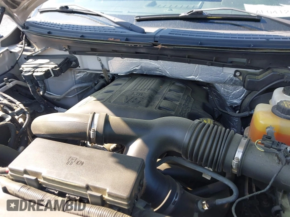 2013 Ford F-150 XL with VIN 1FTFW1ET0DFC85741, listed as a IAAI auction lot 42022221 with 156,509 mi miles. Bid and sale history available at carsss.com. Image 10.