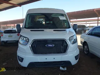 2024 Ford Transit Passenger XL z VIN 1FBAX2CG2RKA75017, wystawiony jako IAAI lot #42463080 z przebiegiem 20 185 mil mil oraz . Historia ofert i sprzedaży dostępna na DreamBid. Obrazek 12.