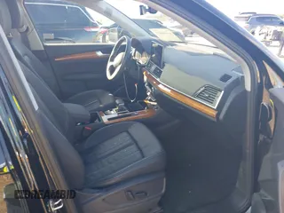 2023 Audi Q5 S line Premium Plus z VIN WA1EAAFY5P2128250, wystawiony jako IAAI lot #40666613 z przebiegiem 27 940 mil mil oraz . Historia ofert i sprzedaży dostępna na DreamBid. Obrazek 5.