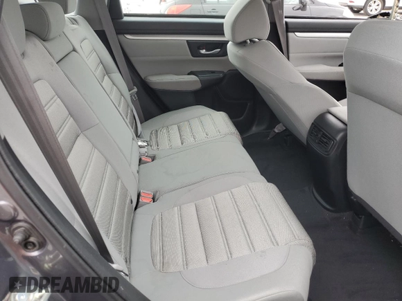 2017 Honda CR-V LX z VIN 2HKRW5H3XHH402429, wystawiony jako Copart lot #57440845 z przebiegiem 17 617 mil mil oraz Szkoda całkowita • Salvage title. Historia ofert i sprzedaży dostępna na DreamBid. Obrazek 11.