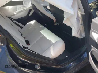 2018 Tesla Model 3 Long Range Battery with VIN 5YJ3E1EBXJF055203, listed as a IAAI auction lot 42019770 with 57,379 mi miles and . Bid and sale history available at DreamBid. Image 8.