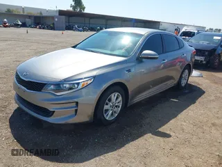 2016 Kia Optima LX with VIN 5XXGT4L39GG116566, listed as a IAAI auction lot 41949407 with 82,679 mi miles and . Bid and sale history available at carsss.com. Image 2.