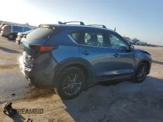 2019 Mazda CX-5 Sport with VIN JM3KFABM5K0676032, listed as a Copart auction lot 52067605 with 59,574 mi miles and Salvage Title. Bid and sale history available at DreamBid. Image 3.