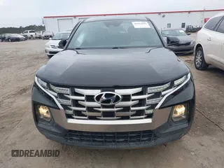 2022 Hyundai Santa Cruz SEL z VIN 5NTJBDAE5NH008011, wystawiony jako IAAI lot #41614699 z przebiegiem 57 484 mil mil oraz . Historia ofert i sprzedaży dostępna na DreamBid. Obrazek 12.